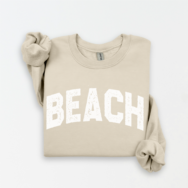 a t - shirt with the word beach printed on it