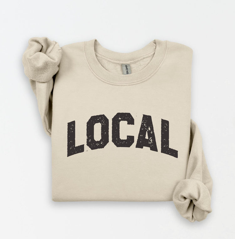 a sweatshirt with the word local printed on it