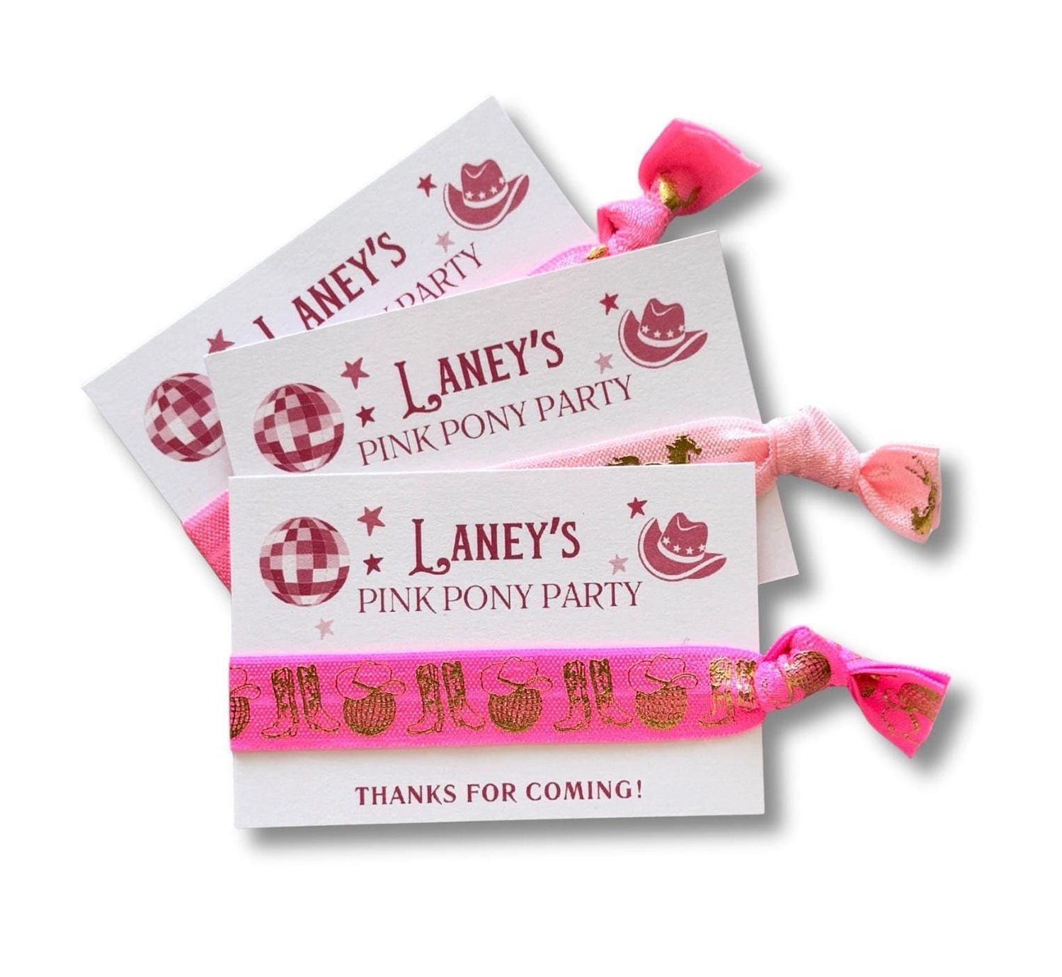 three pink pony party favors with a pink ribbon, each featuring the text "Laney's Pink Pony Party" and "Thanks for coming!"