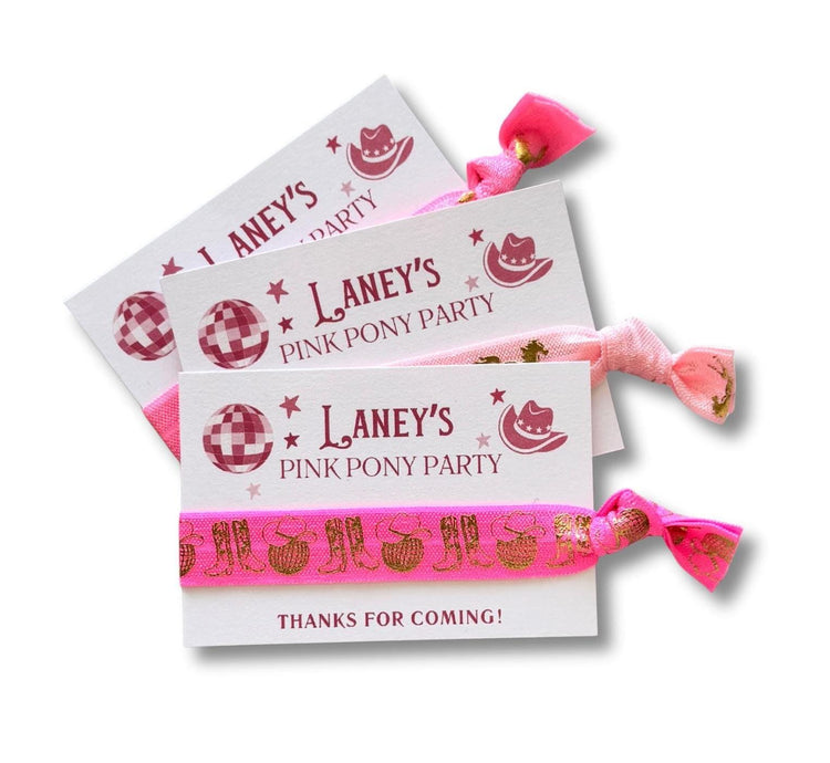 three pink pony party favors with a pink ribbon, each featuring the text "Laney's Pink Pony Party" and "Thanks for coming!"