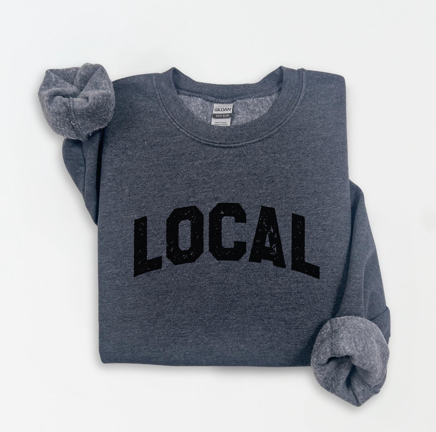 a sweatshirt with the word local printed on it