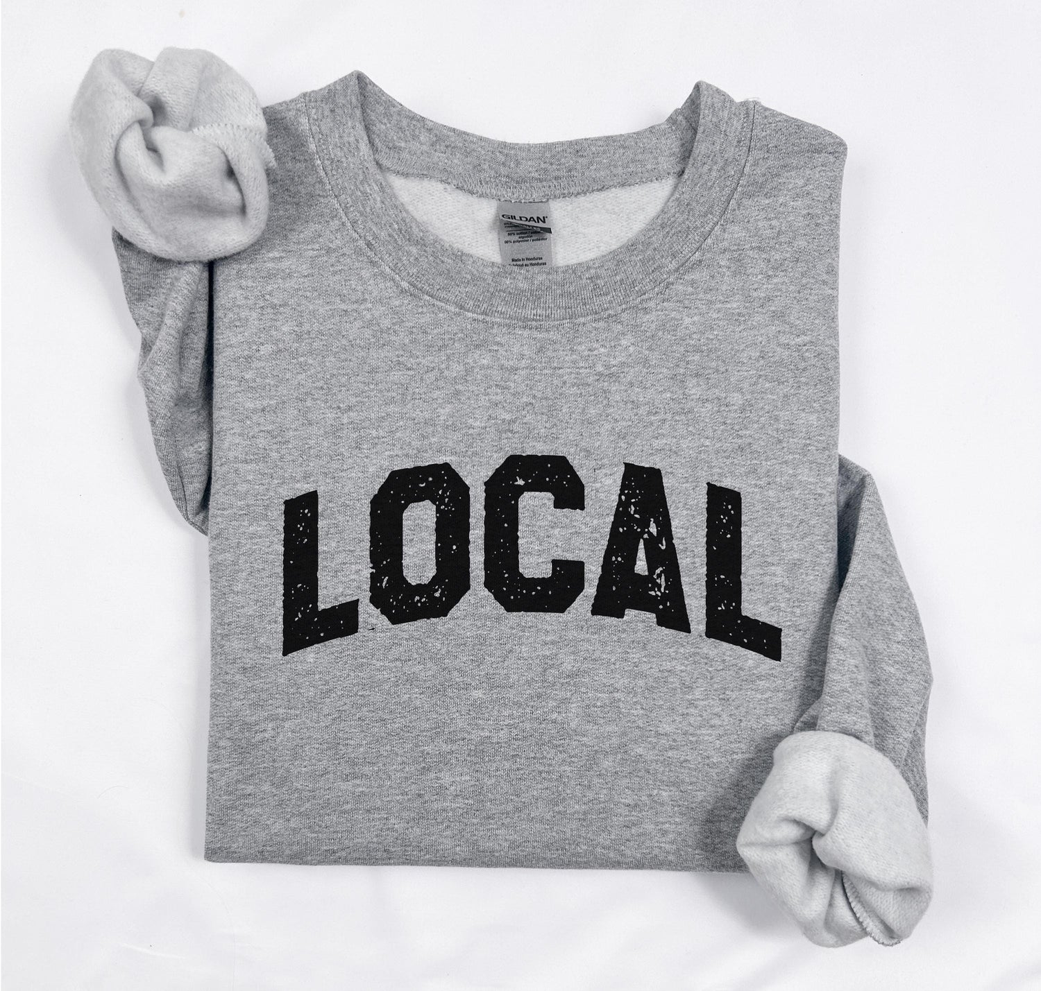 a sweatshirt with the word local printed on it