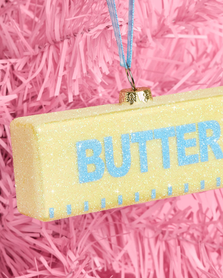 Butter Believe It Ornament - yellow glitter glass ornament