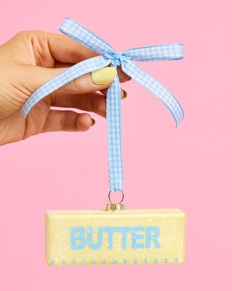 Butter Believe It Ornament - yellow glitter glass ornament