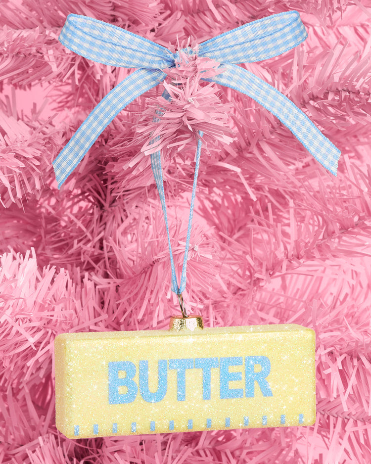 Butter Believe It Ornament - yellow glitter glass ornament